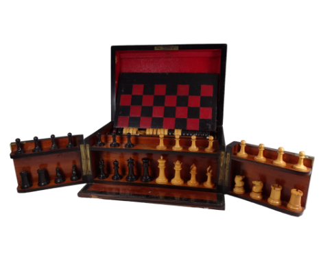 A Victorian coromandel games compendium - containing folding chess and backgammon board, ebonised stained and natural chess a