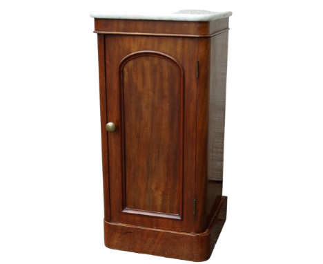 A late 19th century mahogany pot cupboard - with white marble top and arched panel door enclosing a shelf and raised on a pli