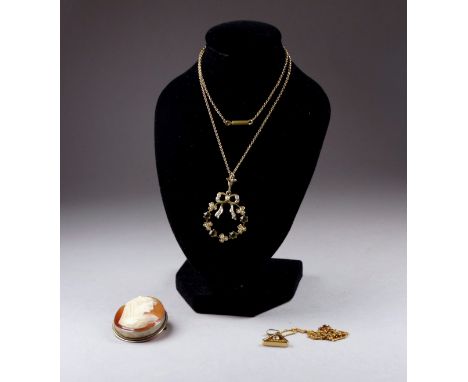 A Belle Epoch wreath pendant - set with seed pearls and peridot in gilt metal frame, weight 3.2g, on a fine link chain, toget