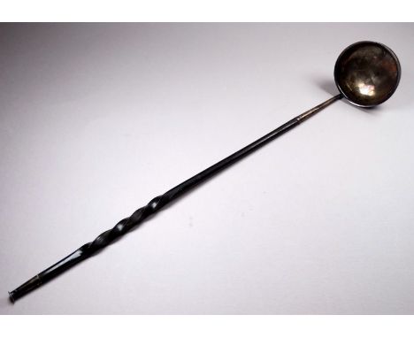A silver plated toddy ladle - with contorted baleen handle, length 39cm.