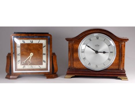 An Art Deco style walnut mantle timepiece by Elliott - with a square silvered dial set out in Roman numerals within a chrome 