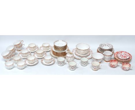A Victorian Staffordshire part tea service - decorated with gilt foliate bands on spiral fluted bodies, eight plus setting, i