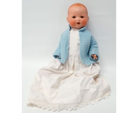 An early 20th century Armand Marseille bisque headed doll - stamped 'AM Germany 351./5.K.', with brown sleeping eyes, open mo