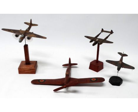 A scratch built desk model of a Lockheed P-36 Lightning - wooden and painted European Theatre RAF colour scheme, height 25cm,