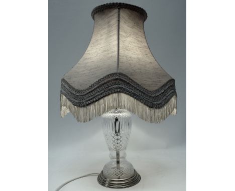 A clear cut glass table lamp - with gilt metal mounts, height 32cm.