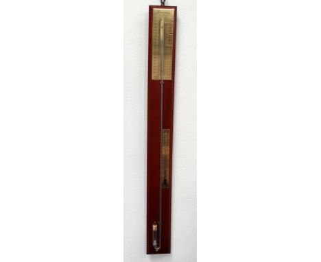 A 20th century mercury stick barometer - mounted on a mahogany panel with brassed scales.