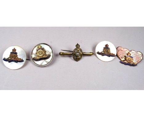 A Royal Artillery 'Mizpah' sweetheart brooch - copper intertwined hearts incorporating an artillery badge, together with thre