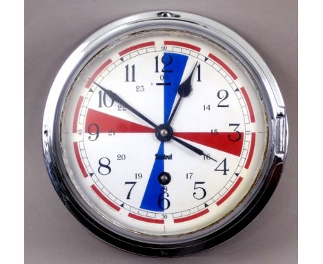 A Sestrel radio room 'Quite Time' bulkhead clock - with a chrome case and white dial marked out in Arabic numerals, with thre