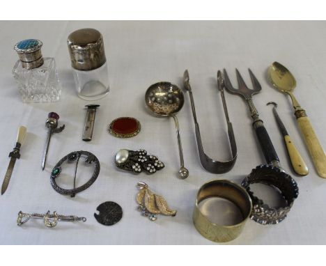 Silver topped smelling salts bottle, cut glass scent bottle with silver and enamel lid (some damage), silver button hole, 2 S