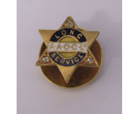 18ct gold and enamel pin badge with diamond accents - A.A.O.C Ltd long service awarded to W A Berry Jan 1920 weight 3.6 g