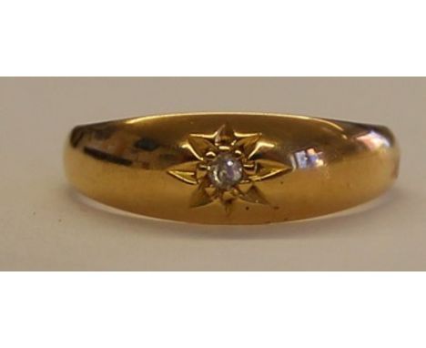 Tested as 18ct gold ring with small diamond accent stone wt 2.2g, size K/L