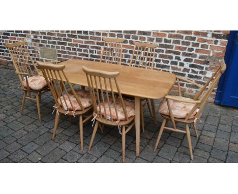 Ercol dining table 150cm by 76cm with 6 dining chairs including 2 carvers