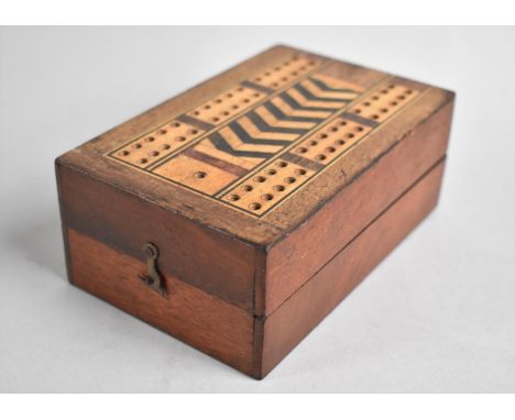 A Late 19th/Early 20th Century Folding Cribbage Board containing Pack of Cards and Small Compartment with Four Pegs, 26cms Wi