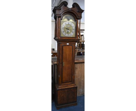 A 19th Century Oak Longcase Clock with Arched Rolling Moon Dial, Pierced Spandrels and Silvered Chapter Ring, Inscribed for W