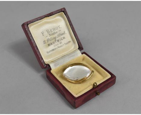A 9ct Yellow and White Gold Mounted Brooch with Mother of Pearl Oval Set with Diamonds, 3.5cm diameter in Vintage Box for F B