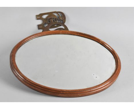 An Art Nouveau Wall Mounting Shaving Mirror on Hinged Brass Bracket, 31cm high 