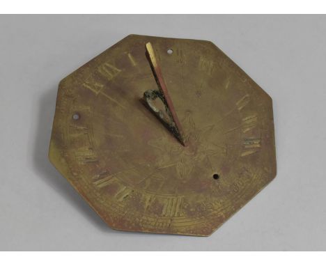 A Reproduction Octagonal Brass Sundial, Inscribed Tempus Fugit 1667, 20cms Diameter 