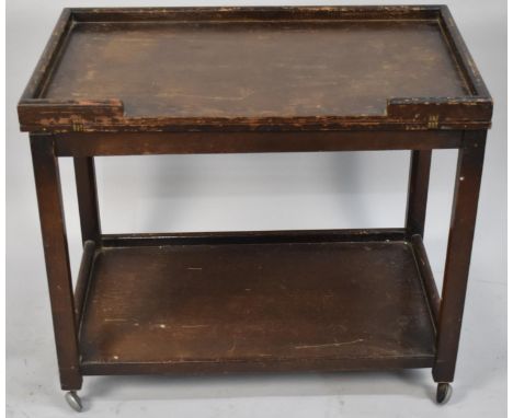 A Vintage Oak Two Tier Lift and Twist Top Tolley, 67cm wide 