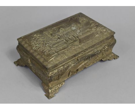 An Early/Mid 20th Century Oriental Metal Casket Decorated in Relief with Pagoda Scenes Having Greek Key Trim, Raised on Scrol