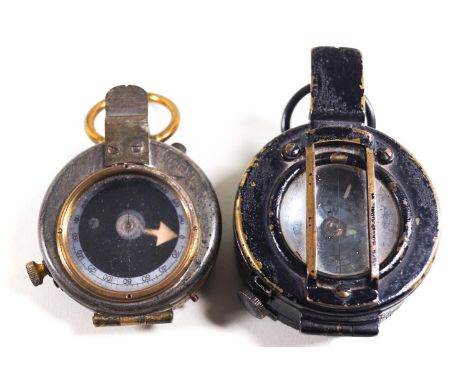 A WWII military issue compass, stamped T G Colt, London, 1940 and another military issue compass
