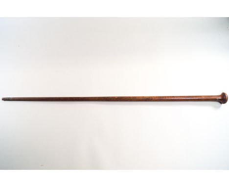 A WW1 mahogany swagger stick, inlaid with a plane, and brass inlaid with the letter 'N', 84cm long