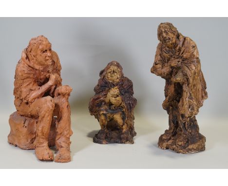 Ron Olley - A terracotta figure  of a seated beggar, 28cm higha nd two ceramic en suite, 22 and 23cm, signed