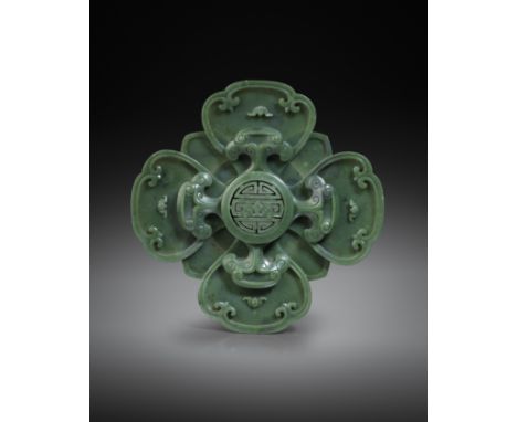 A FINE CHINESE IMPERIAL SPINACH-GREEN JADE QUATREFOIL 'WUFU' STAND FOUR-CHARACTER QIANLONG MARK AND OF THE PERIOD 1736-95  De