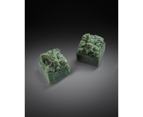 A PAIR OF FINE CHINESE IMPERIAL SPINACH-GREEN JADE 'DRAGON' SEALS 18TH/19TH CENTURY  Each with a square-section body surmount