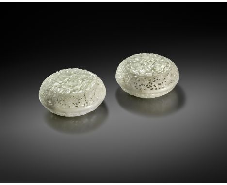 A PAIR OF FINE CHINESE WHITE JADE CIRCULAR INCENSE BOXES AND COVERS 18TH CENTURY  With shallow bodies and low domed covers, e
