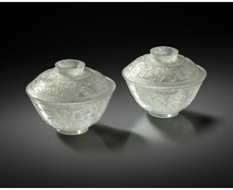 A PAIR OF CHINESE WHITE JADEITE 'BAJIXIANG' BOWLS AND COVERS 19TH CENTURY  The U-shaped vessels gently flaring at the rims, e