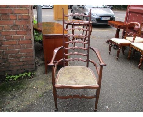 An early 20th century mahogany Arts &amp; Crafts Mackintosh style ladder back armchair 