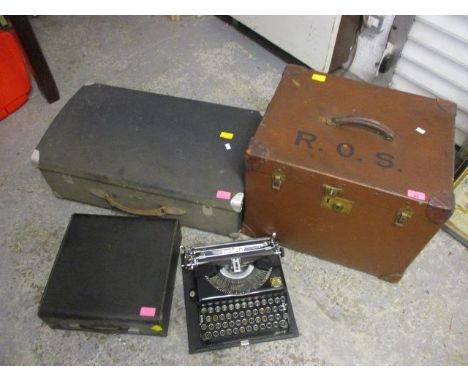 A mixed lot to include an Imperial typewriter, a leather bound hat box and a vintage suitcase 