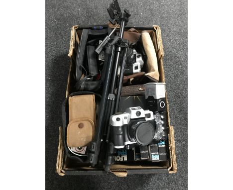 A box of cameras and accessories, camera tripod etc 