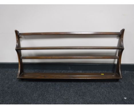 An Ercol wall shelf 