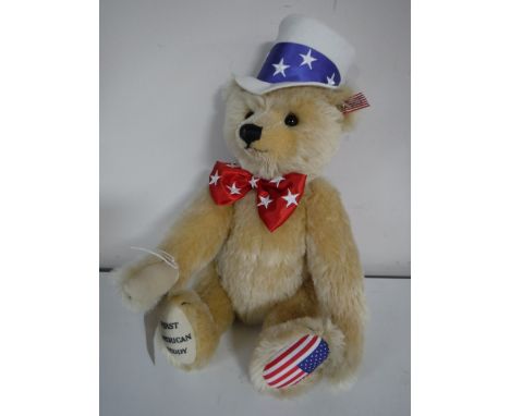 A Steiff blond mohair bear - First American Teddy, length 42 cm.