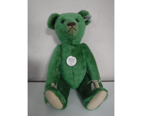 A Steiff green 1908 mohair bear, length 35 cm.