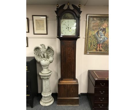 A nineteenth century oak longcase clock with painted dial by J A Thompson of Darlington, height 230 cm.