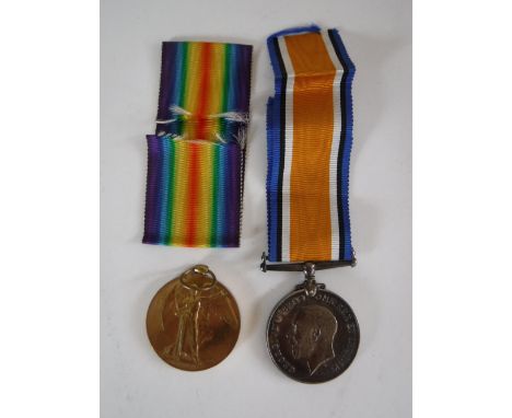 A First World War pair comprising Victory Medal and British War Medal, named to Lieut. J. W. Henderson