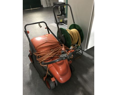 A Flymo compact 330 mower and hose on reel 