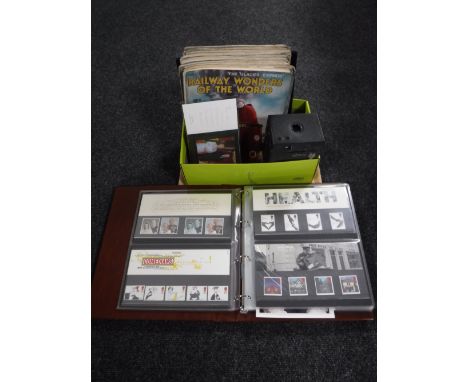 A tray of album of Royal Mail presentation packs, Royal Mail stamp books, vintage railway wonders of the world, cartridge Haw