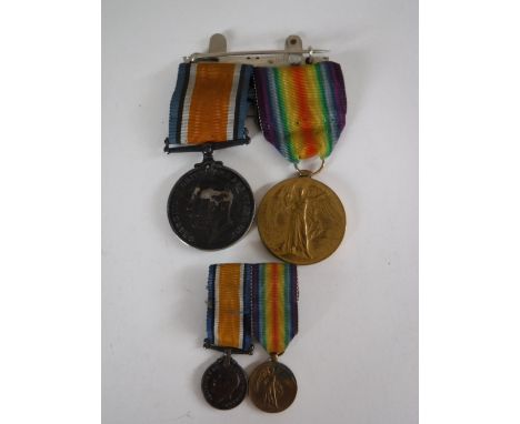 A First World War pair comprising Victory Medal and British War Medal named to M. A. Trigg V.A.D., with miniatures