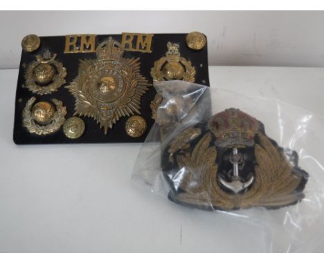 A collection of Royal Marine buttons together with naval patch