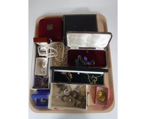 A tray of collection of costume jewellery, silver dress ring and two antique portrait pendants 