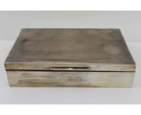 GARRARD &amp; CO. LTD, A SILVER CIGARETTE BOX, hinged engine turned cover, Birmingham 1961, cedar lined, monogrammed J.D.E., 