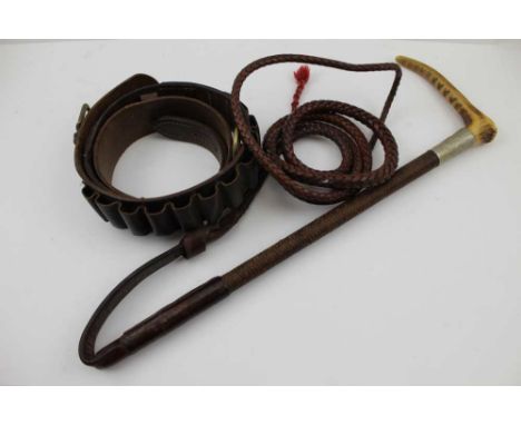 AN EARLY 20TH CENTURY PLAITED LEATHER HORSE WHIP with antler handle, retailed by 'Swain &amp; Co. London', the collar inscrib
