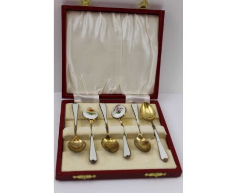 ADIE BROTHERS, A CASED SET OF SILVER GILT &amp; ENAMEL COFFEE SPOONS, white guilloche enamel handles and reverse of bowls, en