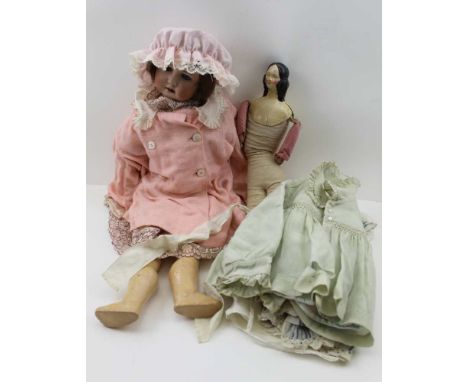 A WILLIAM GOEBEL, EARLY 20TH CENTURY BISQUE HEAD DOLL with composition body, 58cm high, complete with various clothes, also a