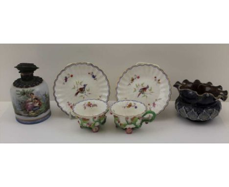 A DOULTON LAMBETH STONEWARE WALL POCKET, 9cm in diameter, a continental scent bottle and a pair of European porcelain cups an