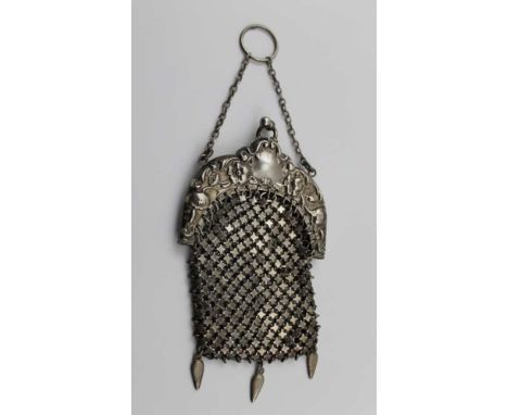 A SILVER MESH PURSE, with embossed mounts, Art Nouveau floral decoration with chain handle, internally stamped 'Sterling', 9.
