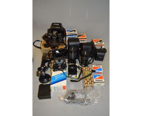 A BOX OF PHOTOGRAPHIC EQUIPMENT, including a Nikon F301 SLR body, a boxed Tokina SZ-X 270 Zoom lens, a boxed Tamron 80-210 1: